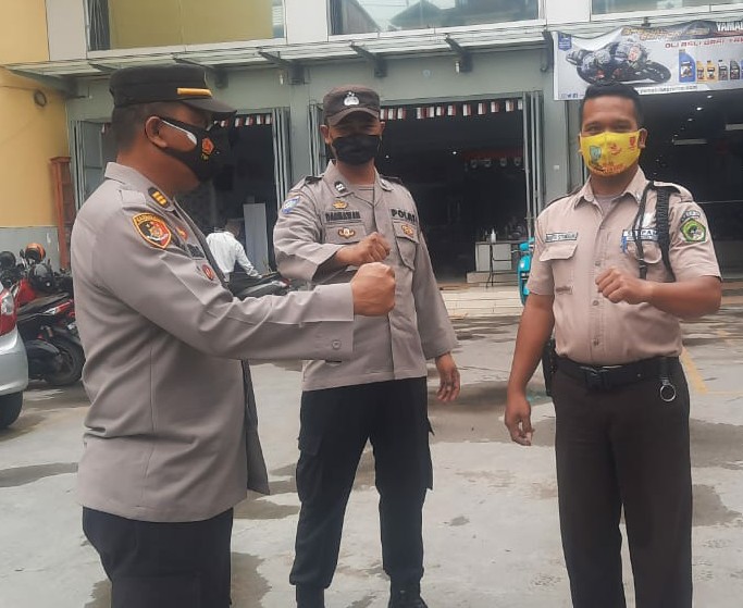 Binmas Polrestabes Medan Ajak Satpam Bank Tetap Patuhi Prokes