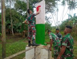 Wujudkan Keindahan Kampung Perbatasan Papua Satgas Yonif 123/RW Cat Ulang Gapura
